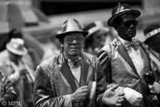 Queen Street Auckland city, Farmers Santa Parade, black and white photo by Mike Wheelton